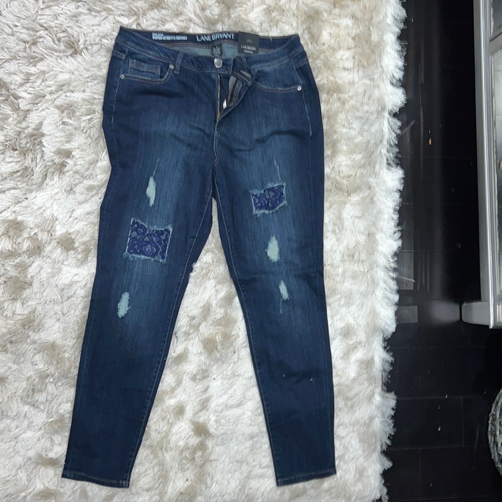 Torrid Denim with distressing and lace